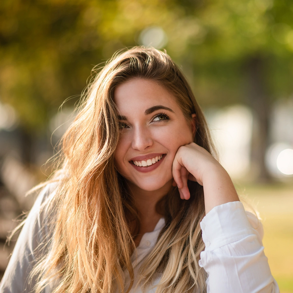 Confident patient smiling after treatment